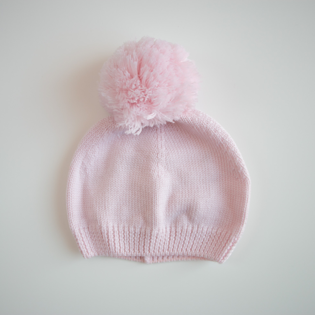 Cappellino in lana con pompon